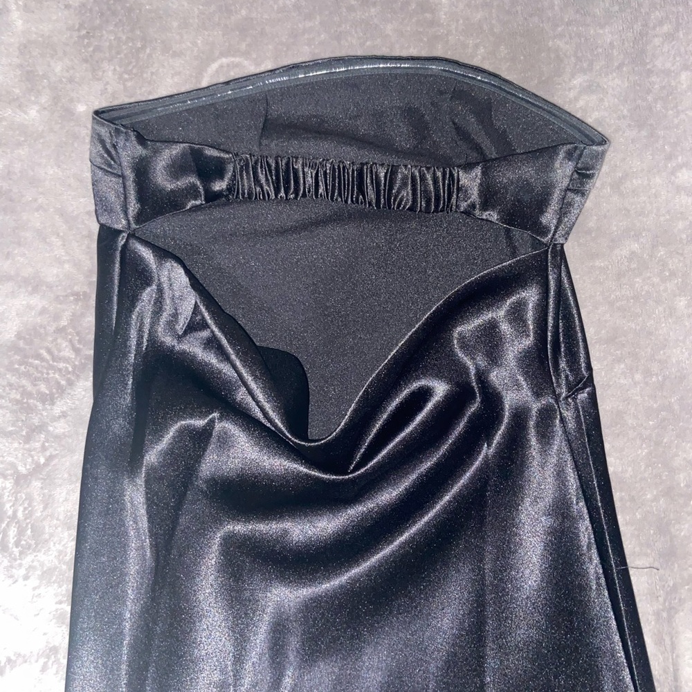 Steeples and backless black dress